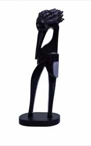 Betty Paiz, CHI'ICHm black marmorine and wood sculpture, 90x12x20 cm. 2018