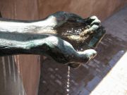 11-hands-with-dripping-water-detail