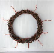 Icehouse installation wreath wall